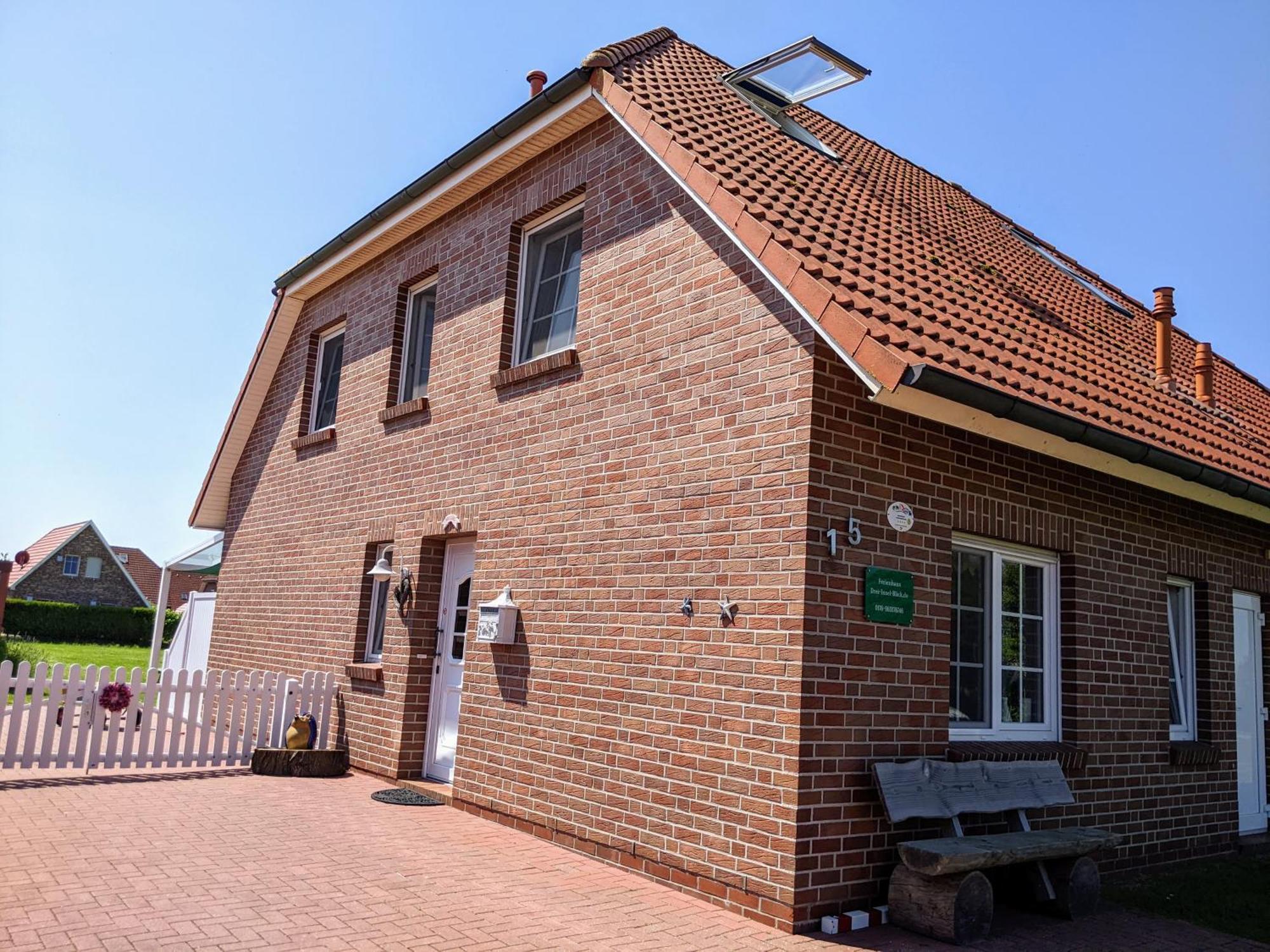 Drei-Insel-Blick Neßmersiel Kültér fotó